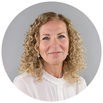 Professional headshot of woman with long hair
