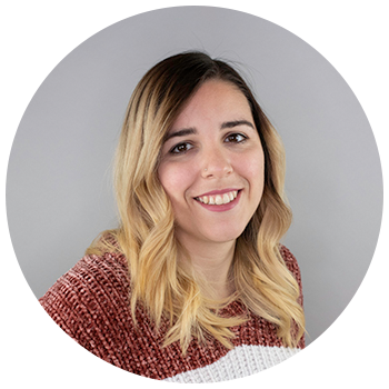 Professional headshot of woman with long hair